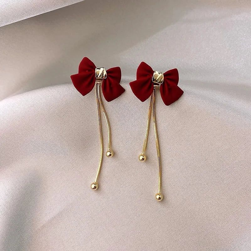 Dainty Bow Gold Dangle Earrings